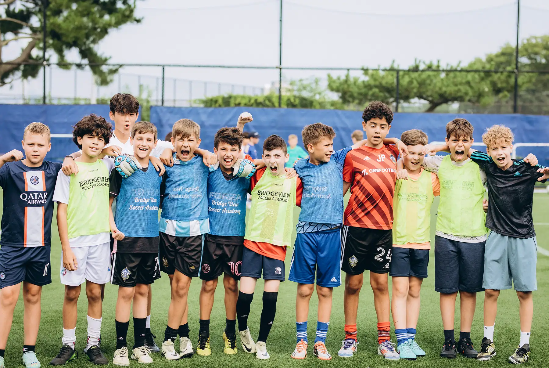 Coach working with young players at Bridgeview Soccer Academy